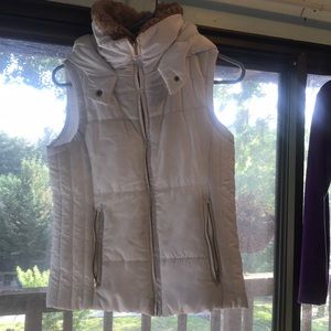 White fur vest